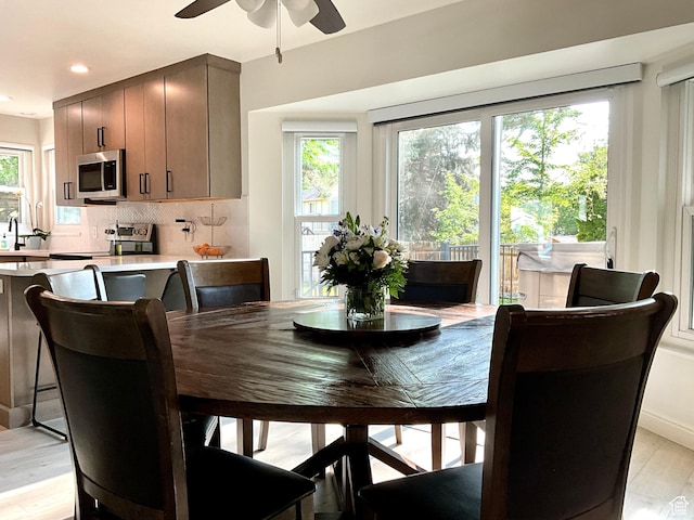 9574 S Equestrian Park Cir, Sandy, UT 84092 - dining area with a ceiling fan, light wood finished floors, and recessed lighting