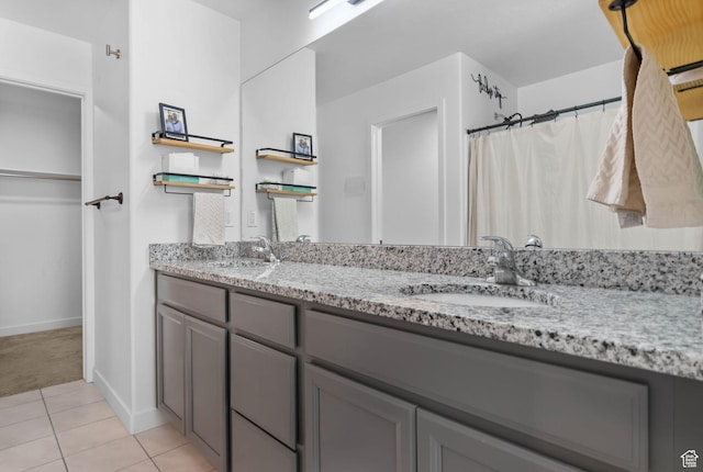15223 S Wild Horse Way, Bluffdale, UT 84065 - full bathroom with double vanity, tile patterned floors, and baseboards