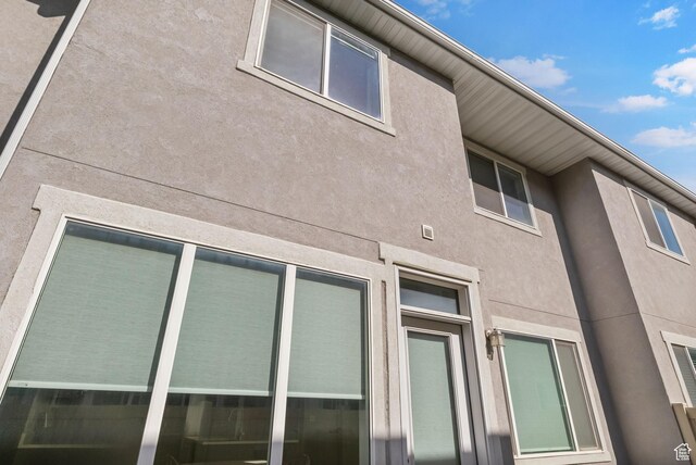 15223 S Wild Horse Way, Bluffdale, UT 84065 - view of property exterior with stucco siding