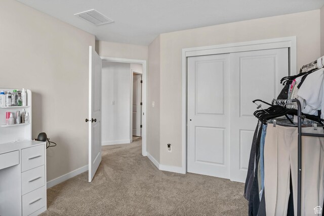15223 S Wild Horse Way, Bluffdale, UT 84065 - bedroom featuring light carpet, baseboards, and a closet