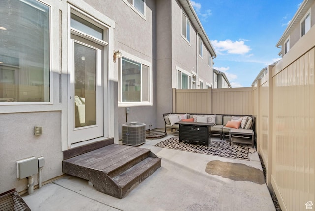 15223 S Wild Horse Way, Bluffdale, UT 84065 - fenced backyard with outdoor lounge area, a patio area, and central AC