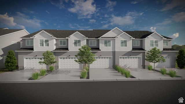 1077 N Canvasback Dr Unit 410, Lehi, UT 84043 - view of property featuring an attached garage, driveway, and a residential view