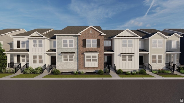 1077 N Canvasback Dr Unit 410, Lehi, UT 84043 - multi unit property with board and batten siding, entry steps, and stone siding