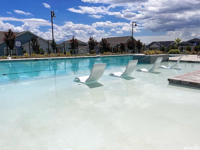 6034 W Sparrow View Dr, South Jordan, UT 84009 - community pool with a residential view