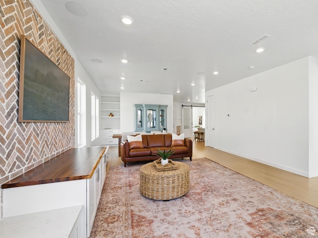 6034 W Sparrow View Dr, South Jordan, UT 84009 - living room featuring light wood-style floors, recessed lighting, and baseboards