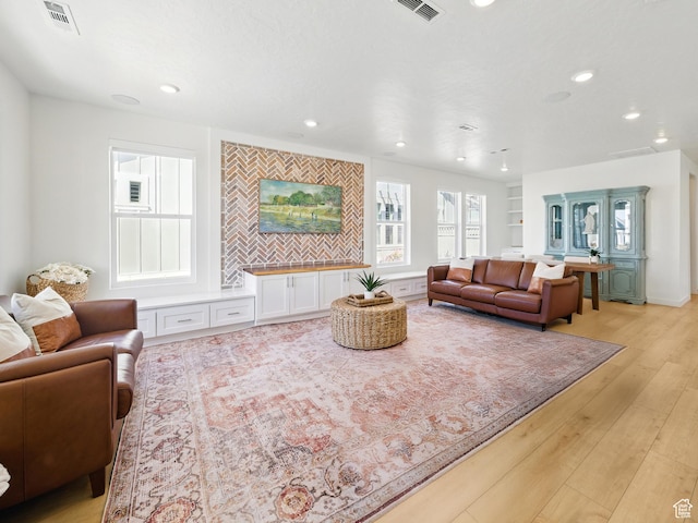 6034 W Sparrow View Dr, South Jordan, UT 84009 - living room with light wood-type flooring and recessed lighting