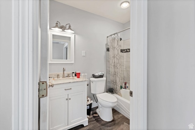 740 W Uzona Ave, Hildale, UT 84784 - bathroom featuring toilet, vanity, wood finished floors, and shower / bath combo with shower curtain