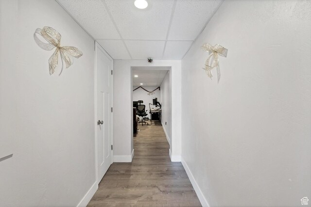 740 W Uzona Ave, Hildale, UT 84784 - corridor with a drop ceiling, light wood-type flooring, baseboards, and a desk