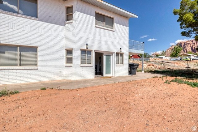 740 W Uzona Ave, Hildale, UT 84784 - back of property with brick siding and a patio