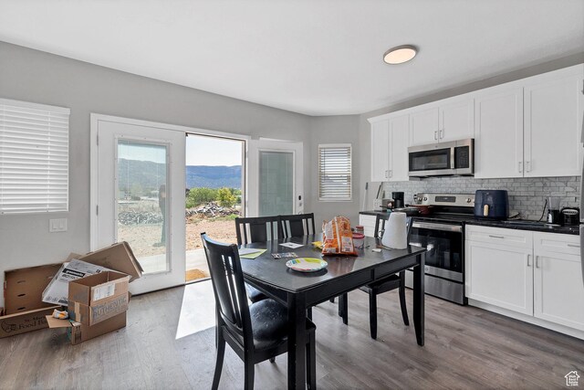 740 W Uzona Ave, Hildale, UT 84784 - dining room featuring wood finished floors and a mountain view