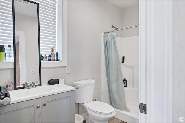 740 W Uzona Ave, Hildale, UT 84784 - bathroom featuring a shower stall, toilet, and vanity