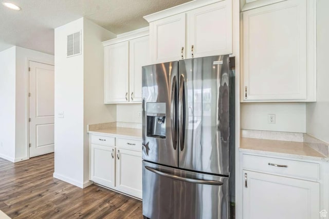 2199 W 650 S, Lehi, UT 84043 - kitchen with stainless steel refrigerator with ice dispenser, dark wood-style floors, white cabinets, baseboards, and recessed lighting