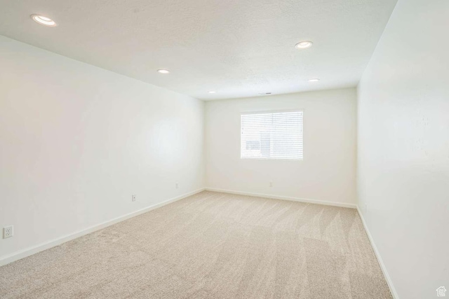 2199 W 650 S, Lehi, UT 84043 - empty room featuring light colored carpet, baseboards, and recessed lighting