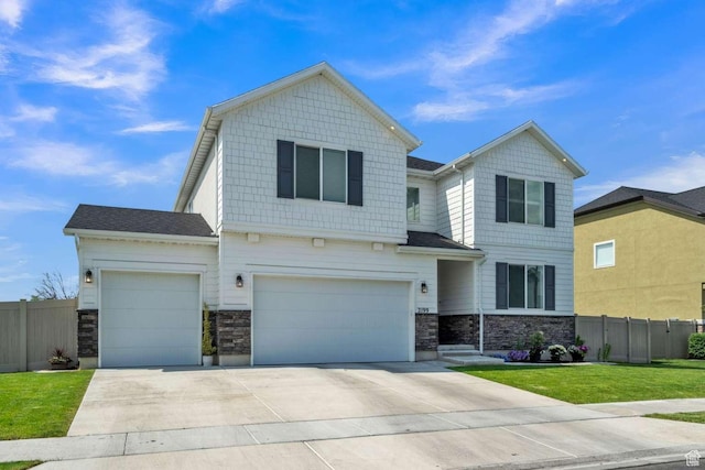 2199 W 650 S, Lehi, UT 84043 - view of front facade featuring stone siding, concrete driveway, and an attached garage