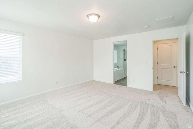2199 W 650 S, Lehi, UT 84043 - unfurnished bedroom with light colored carpet, baseboards, and ensuite bath
