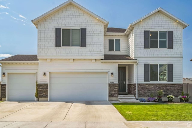 2199 W 650 S, Lehi, UT 84043 - view of front of property featuring stone siding, driveway, a front lawn, an attached garage, and a shingled roof