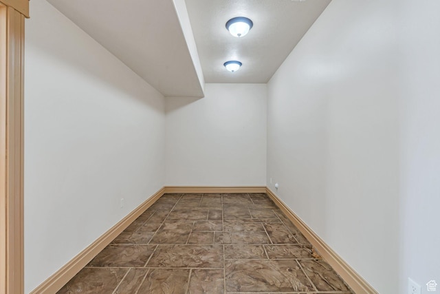 2632 S 2975 W, West Haven, UT 84401 - bonus room featuring baseboards and stone finish floors