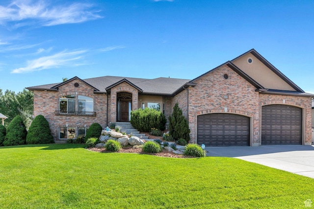 2632 S 2975 W, West Haven, UT 84401 - french country home featuring a front yard, brick siding, an attached garage, and driveway