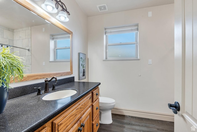 2632 S 2975 W, West Haven, UT 84401 - full bath with toilet, vanity, wood finished floors, curtained shower, and baseboards