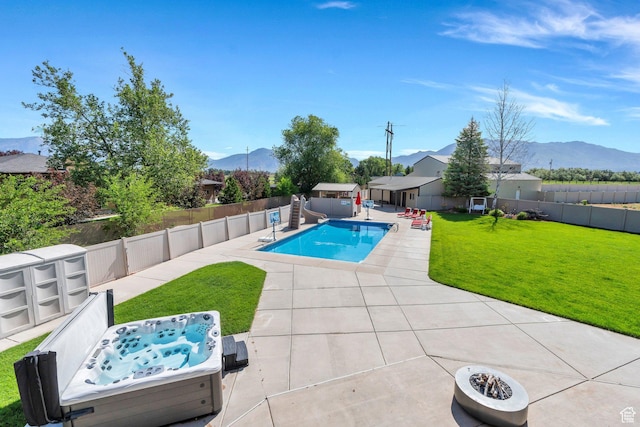 2632 S 2975 W, West Haven, UT 84401 - view of swimming pool with a water slide, a patio area, a mountain view, and a hot tub