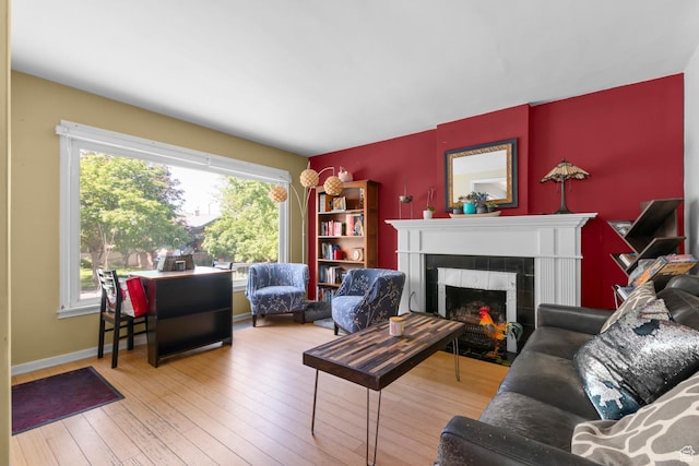 1451 E Redondo, Salt Lake City, UT 84105 - living area with a tiled fireplace and wood-type flooring