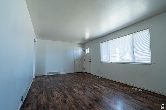 3309 S 8000 W, Magna, UT 84044 - unfurnished room with dark wood finished floors and baseboards