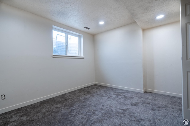 3309 S 8000 W, Magna, UT 84044 - empty room featuring a textured ceiling, dark carpet, recessed lighting, and baseboards
