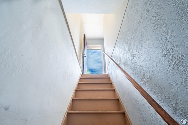 3309 S 8000 W, Magna, UT 84044 - staircase with a textured wall