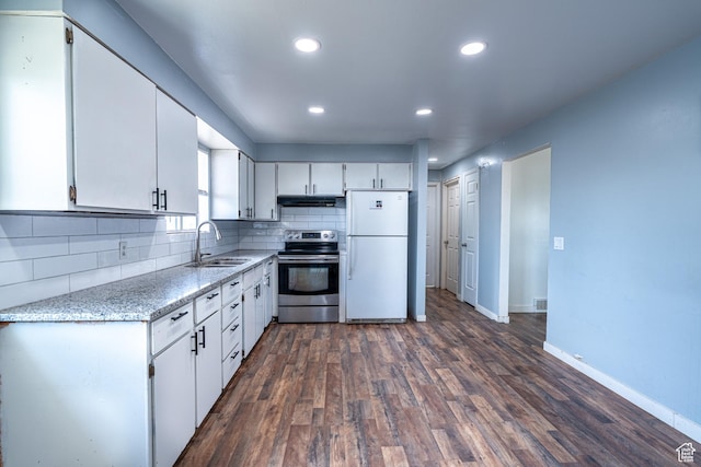 3309 S 8000 W, Magna, UT 84044 - kitchen featuring stainless steel range with electric cooktop, freestanding refrigerator, a sink, under cabinet range hood, and white cabinets