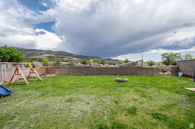 1790 E Homestead, Enoch, UT 84721 - view of yard with a mountain view and a playground