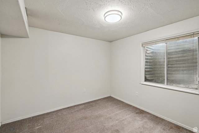 1790 E Homestead, Enoch, UT 84721 - carpeted spare room featuring a textured ceiling and baseboards