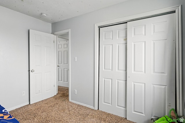 1790 E Homestead, Enoch, UT 84721 - unfurnished bedroom featuring light carpet, baseboards, and a closet