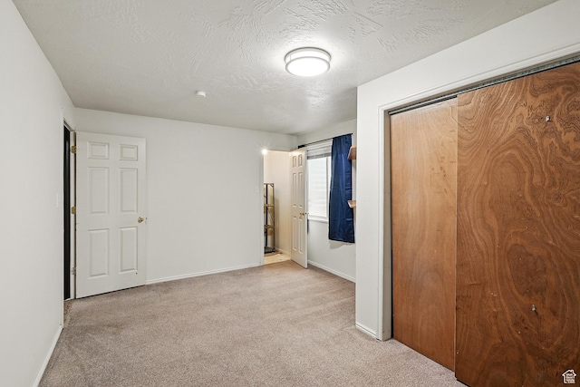1790 E Homestead, Enoch, UT 84721 - unfurnished bedroom with carpet floors, baseboards, a closet, and a textured ceiling
