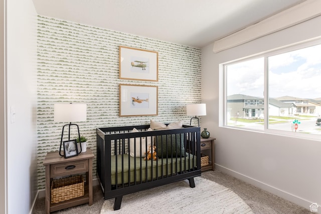 1803 E Bison Dr Unit B212, Eagle Mountain, UT 84005 - bedroom with baseboards, multiple windows, wallpapered walls, carpet floors, and a crib