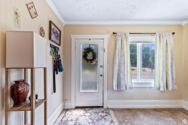 381 E 300 S, Logan, UT 84321 - foyer entrance featuring ornamental molding, baseboards, carpet, and a textured ceiling