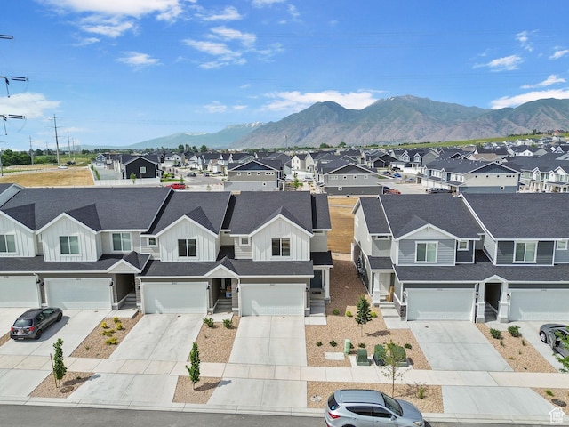 3547 E 1360 S, Spanish Fork, UT 84660 - view of front facade with board and batten siding, a residential view, driveway, and a garage