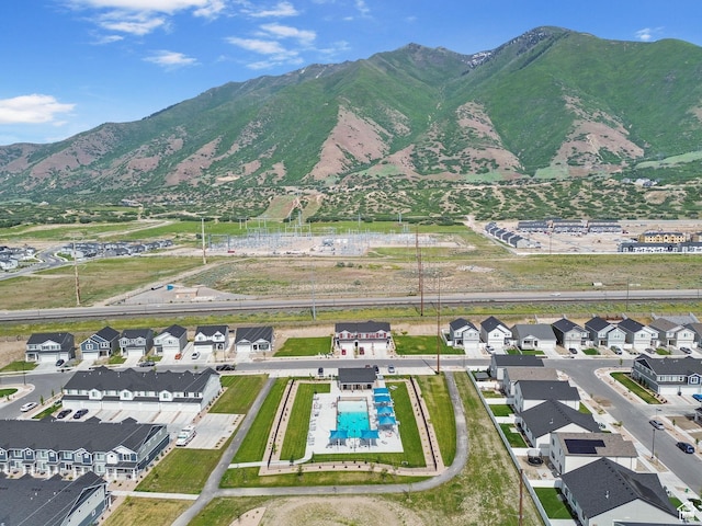 3547 E 1360 S, Spanish Fork, UT 84660 - aerial perspective of suburban area featuring a pool and a mountainous background