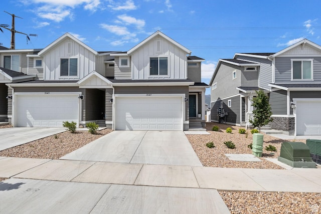 3547 E 1360 S, Spanish Fork, UT 84660 - view of front of home with board and batten siding, an attached garage, and concrete driveway