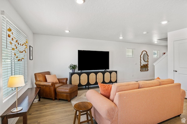 3547 E 1360 S, Spanish Fork, UT 84660 - living area featuring light wood-type flooring, recessed lighting, and baseboards