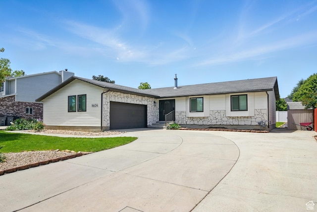 9604 S Stornoway Cir W, South Jordan, UT 84009 - ranch-style home featuring curved driveway and a garage