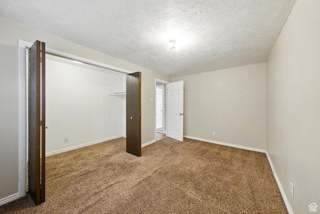 9604 S Stornoway Cir W, South Jordan, UT 84009 - unfurnished bedroom with carpet floors, a textured ceiling, baseboards, and a closet