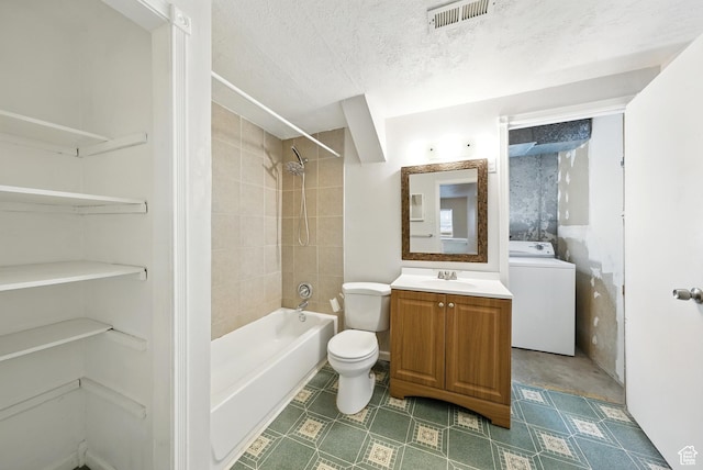 9604 S Stornoway Cir W, South Jordan, UT 84009 - full bathroom featuring washer / clothes dryer, shower / bath combination, vanity, toilet, and a textured ceiling