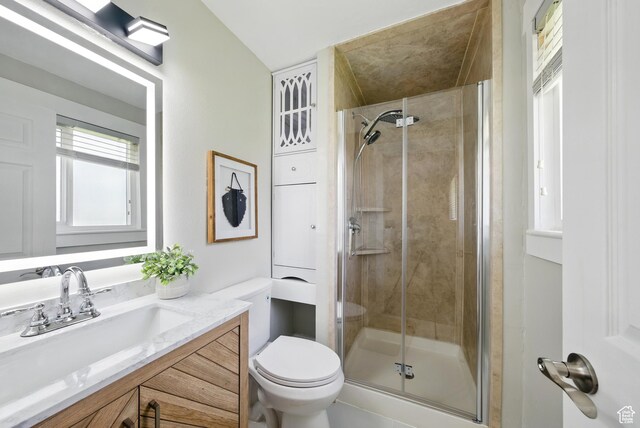 9604 S Stornoway Cir W, South Jordan, UT 84009 - bathroom featuring a shower stall, vanity, and toilet