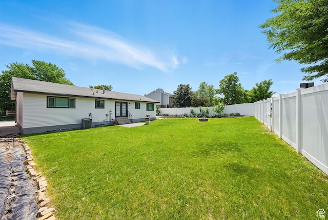 9604 S Stornoway Cir W, South Jordan, UT 84009 - view of yard with french doors, entry steps, and central air condition unit