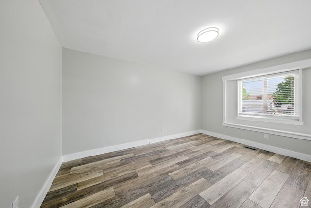 9604 S Stornoway Cir W, South Jordan, UT 84009 - spare room with wood finished floors and baseboards