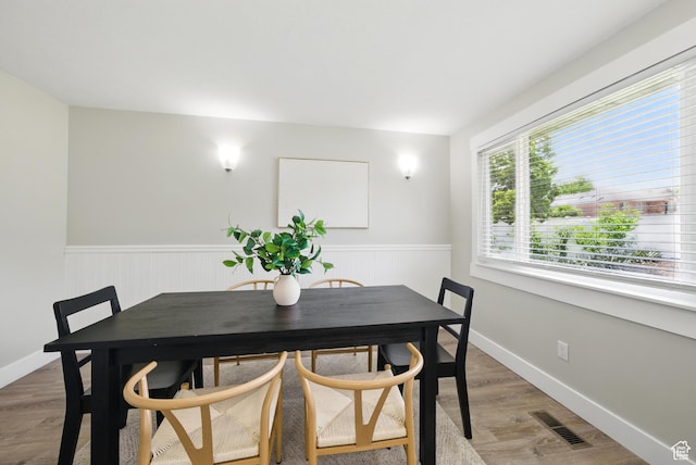 9604 S Stornoway Cir W, South Jordan, UT 84009 - dining space with a wainscoted wall and light wood-type flooring