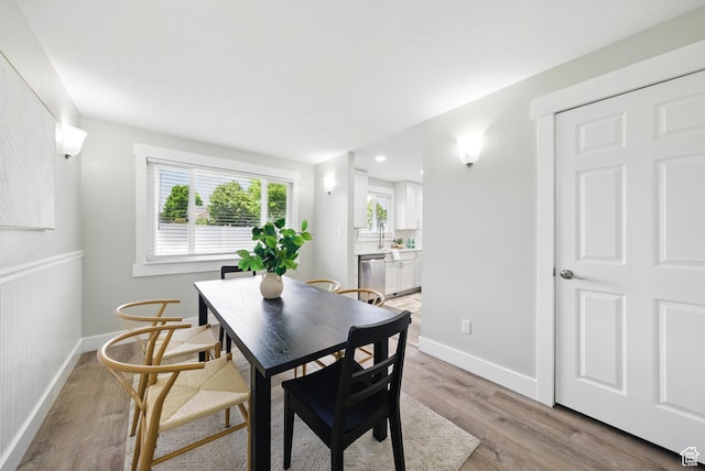 9604 S Stornoway Cir W, South Jordan, UT 84009 - dining area with light wood-style flooring and baseboards
