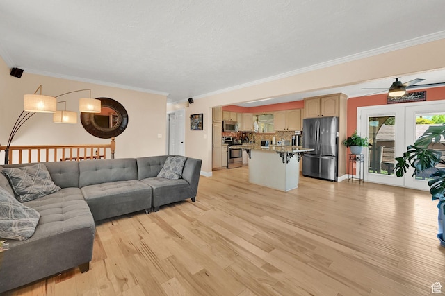 1368 E 5800 S, South Ogden, UT 84405 - living room with ornamental molding, light wood-style floors, ceiling fan, and baseboards