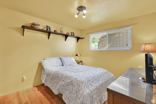 1368 E 5800 S, South Ogden, UT 84405 - bedroom featuring wood finished floors and baseboards