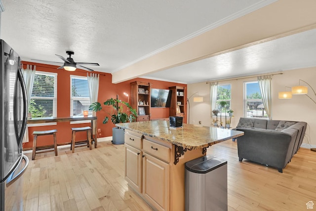 1368 E 5800 S, South Ogden, UT 84405 - kitchen featuring freestanding refrigerator, light wood-style flooring, open floor plan, a textured ceiling, and ceiling fan